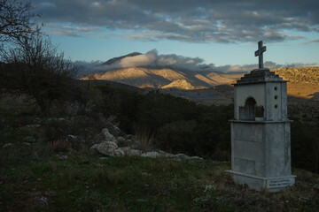 Fototapeta premium cloudy mountain and grave