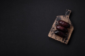 Delicious black blood sausage or black pudding with spices and herbs