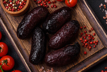 Delicious black blood sausage or black pudding with spices and herbs