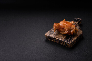 Delicious juicy chicken thighs baked on the grill with salt