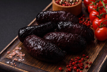 Delicious black blood sausage or black pudding with spices and herbs