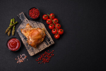 Delicious juicy chicken thighs baked on the grill with salt