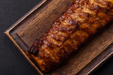 Delicious juicy grilled ribs with honey and mustard sauce