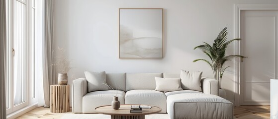 Simple living room with a grey sofa, a coffee table, and a single abstract artwork, minimal decor and neutral tones, open and airy