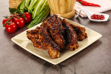 Grilled pork ribs in barbecue sauce