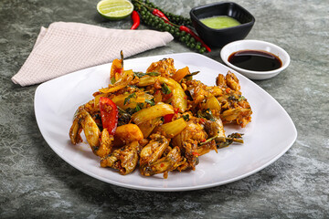 Vietnamese cuisine - fried frog with vegetables