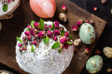 Easter cake with Swiss meringue and  flowers. Easter eggs