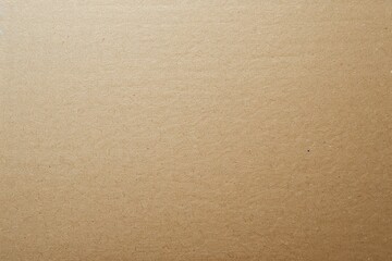 Closeup of cardboard with brown and peach shades