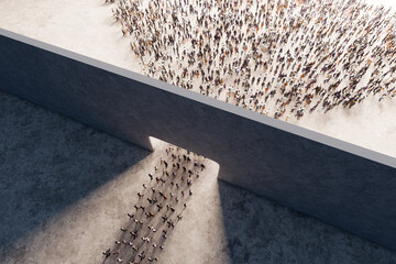 Top view of crowd of people walk through gate and disperse towards light