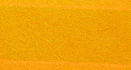 Fototapeta premium Bright orange background texture for summer season. Yellow orange fabric abstract background with copy space for design. 