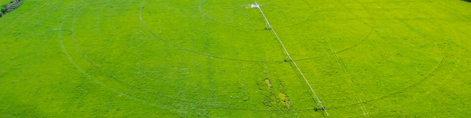 Panorama center pivot irrigation on large farm grassland in Fairland, Oklahoma, stainless steel...