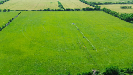 Center pivot irrigation on large farm grassland in Fairland, Oklahoma, stainless steel pipeline...