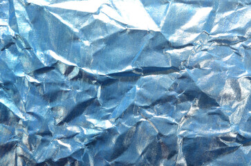 
simple background of crumpled paper in blue