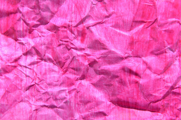 Obraz premium simple background of crumpled pink paper