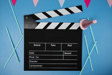 Movie clapperboard and birthday decorations, birthday movie ticket discount