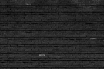 Old black brick wall. Abstract interior background.