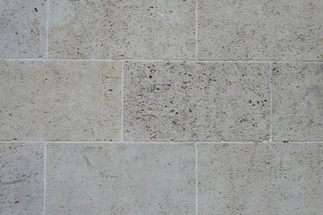 Mur en pierre calcaire fossile beige
