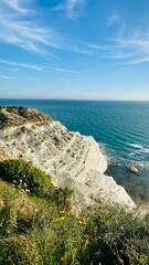 White rock cliff and sea