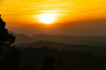 dramatic sunset over the mountains of Northern Thailand