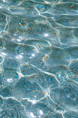 Obraz premium Clear water in the rays of the sun. Water background.