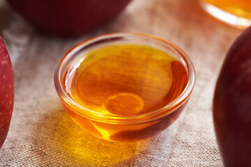 Apple cider vinegar in a glass bottle