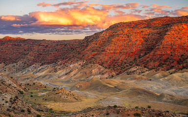 Te red rocky mountains of the Arches National Park in Utah in sunset.