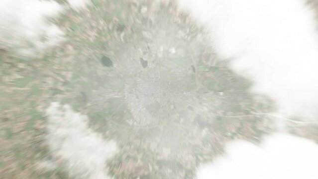 Earth zoom in from space to Herning, Denmark. Followed by zoom out through clouds and atmosphere into space. Satellite view. Travel intro. Images from NASA
