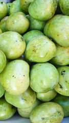 Green and unripe Philippine Manga but are ready to eat.