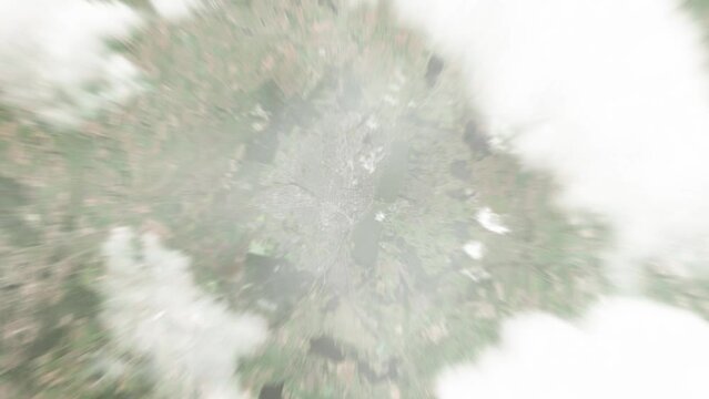 Earth zoom in from space to Viborg, Denmark. Followed by zoom out through clouds and atmosphere into space. Satellite view. Travel intro. Images from NASA