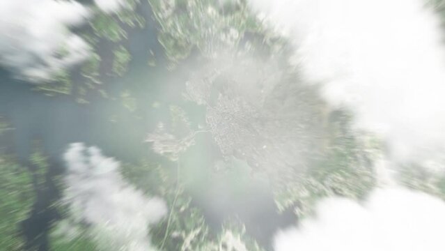 Earth zoom in from space to Vaasa, Finland. Followed by zoom out through clouds and atmosphere into space. Satellite view. Travel intro. Images from NASA