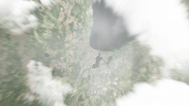 Earth zoom in from space to Jonkoping, Sweden. Followed by zoom out through clouds and atmosphere into space. Satellite view. Travel intro. Images from NASA