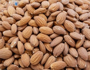 Fototapeta premium Healthy Heap: Background of Raw Peeled Almonds