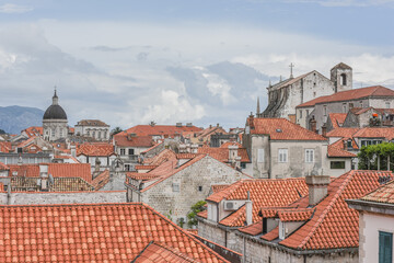 Obraz premium Landscape View Of Old Town Dubrovnik (UNESCO Cultural Heritage) With Beautiful Traditional Buildings, Squares, Churches, Harbor And Islands, Croatia