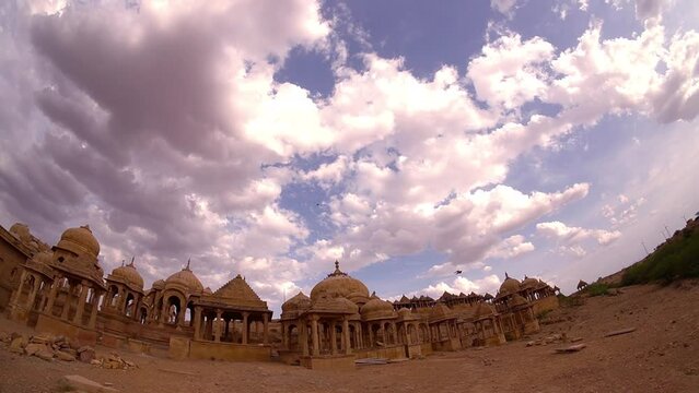 The royal cenotaphs of historic rulers, also known as Jaisalmer Chhatris, at Bada Bagh in Jaisalmer, Rajasthan, India. Cenotaphs made of yellow sandstone