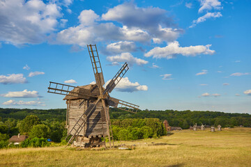 Traditional ukrainian windmill in the museum of national architecture in Pirogovo in a beautiful...