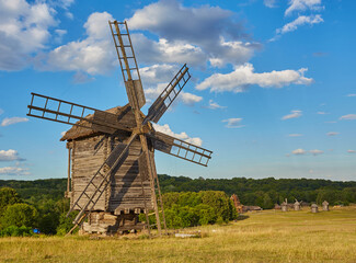 Old Ukrainian windmill under dramatic skies