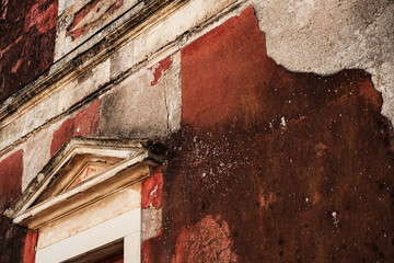 traditional greek architecture, wooden entrance door, old painted walls, rustic texture, abandoned property need maintenance