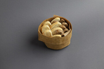 Italian ciabatta bread or bun in a box on the grey background. Freshly baked traditional bread
