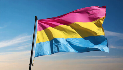 pansexual flag flutters against blue sky, lgbtq pride month, pan