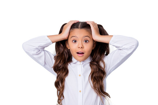 Ready to new school year? Nice cute tender adorable lovely stylish worried girl with curly pigtails in white formal blouse shirt, showing oops gesture. Isolated over grey background