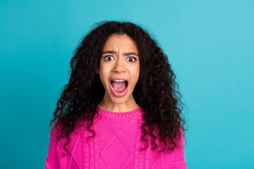 Photo of lovely young girl scream wear pink pullover isolated on teal color background