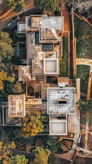 a modern-style villa, designed as a homestay, nestled amidst the picturesque mountains, boasting a meticulously crafted courtyard landscape design, captured in an enchanting overhead view.