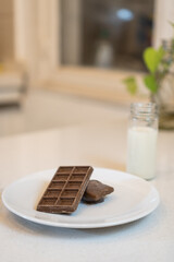 dark chocolate piece on a white plate