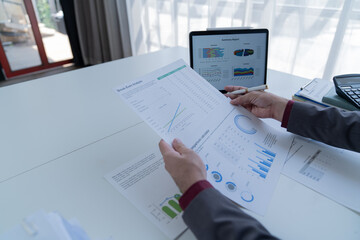 Business Documents concept : Employee woman hands working in Stacks paper files for searching and checking unfinished