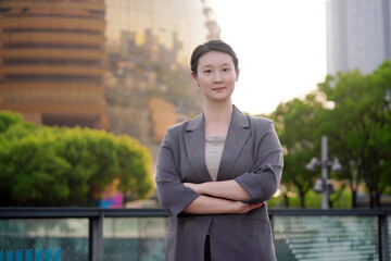 Confident Businesswoman in Urban Setting at Sunset