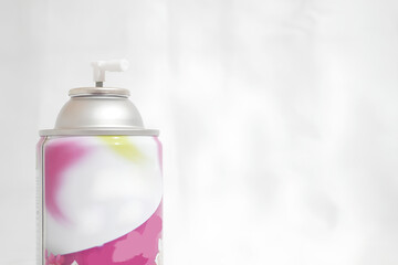 A can of spray paint with a white background