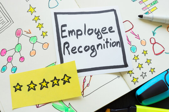 Business notepad and stickers with five stars and inscription employee recognition.