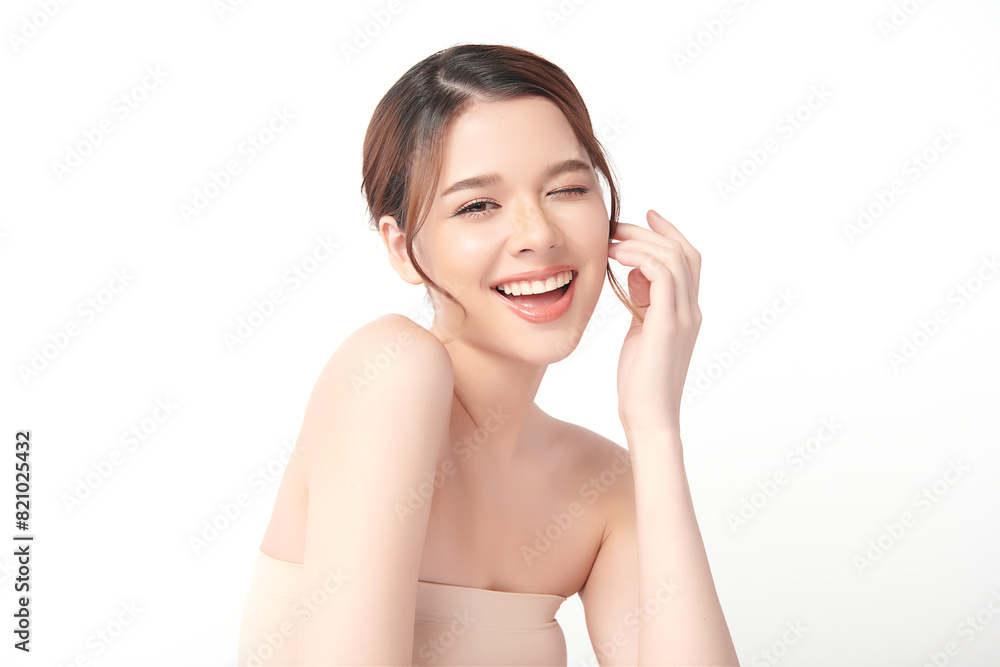 Wall mural beautiful young asian woman with clean fresh skin on white background, face care, facial treatment, 