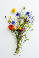 Small bouquet with wildflowers on white background