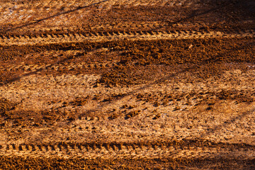 Hard packed dirt along a track at a dirt race track